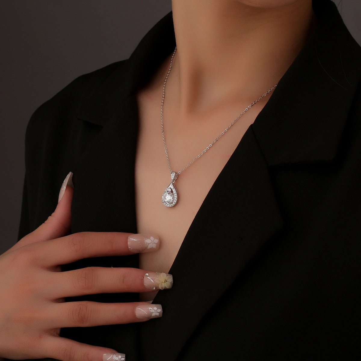Teardrop Round Moissanite Necklace with CZ in White Gold-Plated S925 sterling silver neckline model view showing pendant scale and chain length