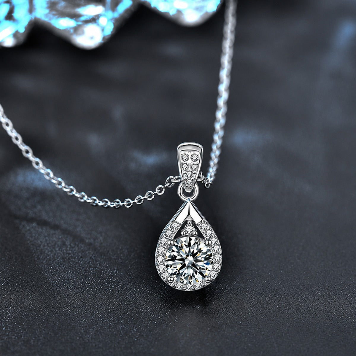 Teardrop Round Moissanite Necklace with CZ in White Gold-Plated S925 sterling silver blue display scene showing chain and stone layout