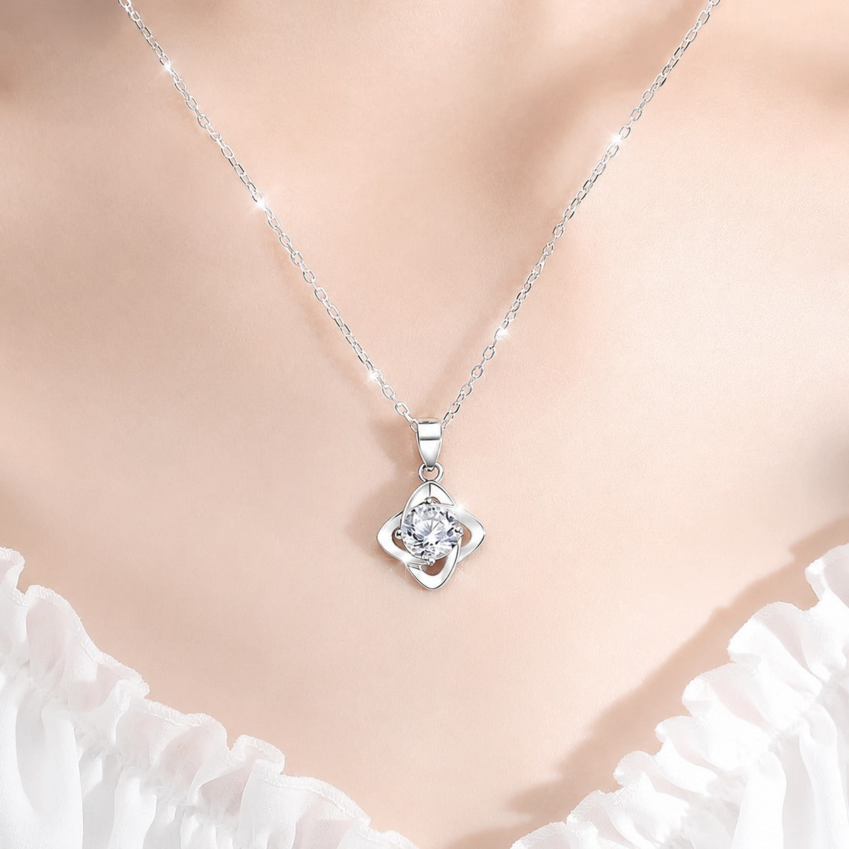 Four-Leaf Clover Round Moissanite Necklace in White Gold-Plated S925 sterling silver neckline model view showing pendant scale and chain length