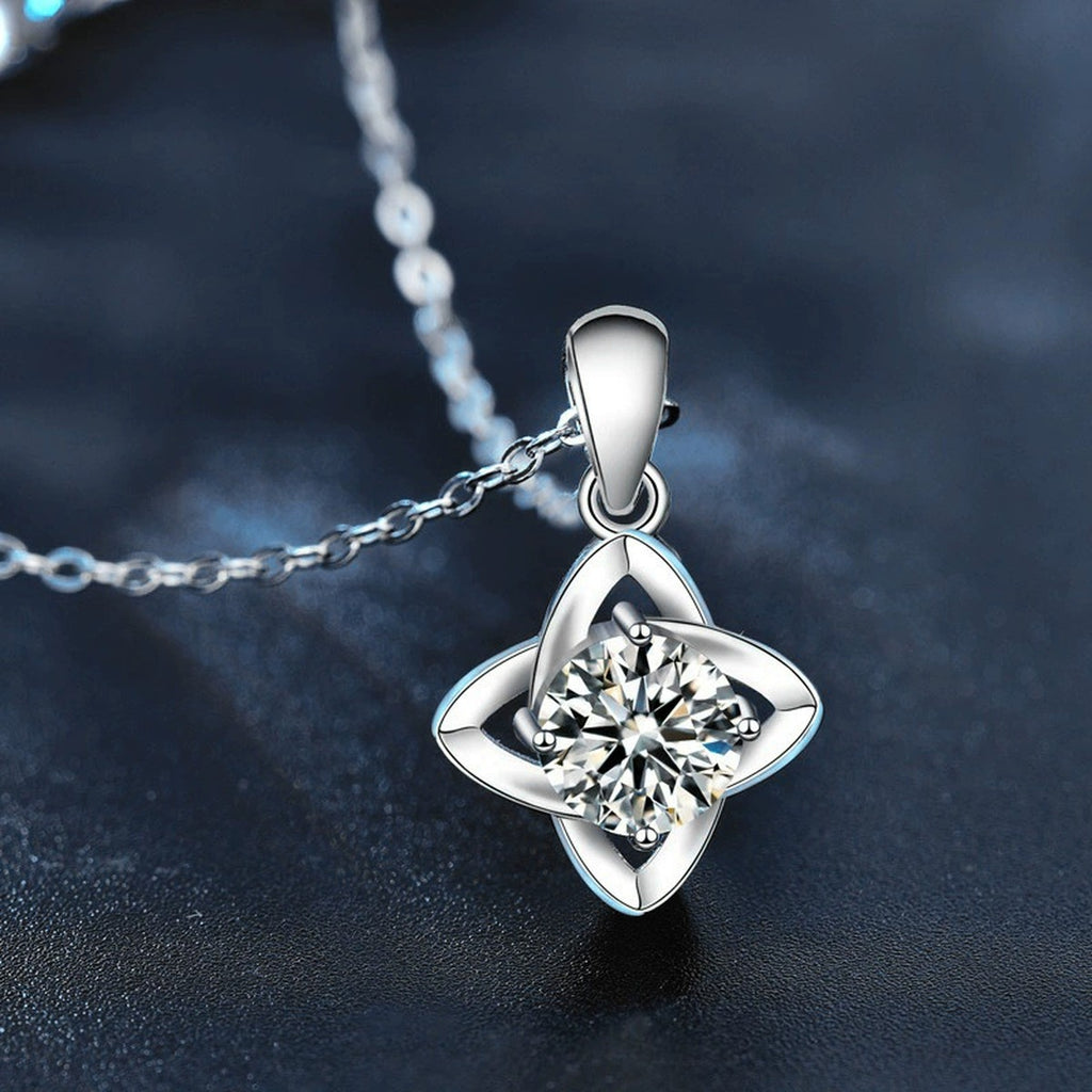 Four-Leaf Clover Round Moissanite Necklace in White Gold-Plated S925 sterling silver blue display scene showing chain and stone layout