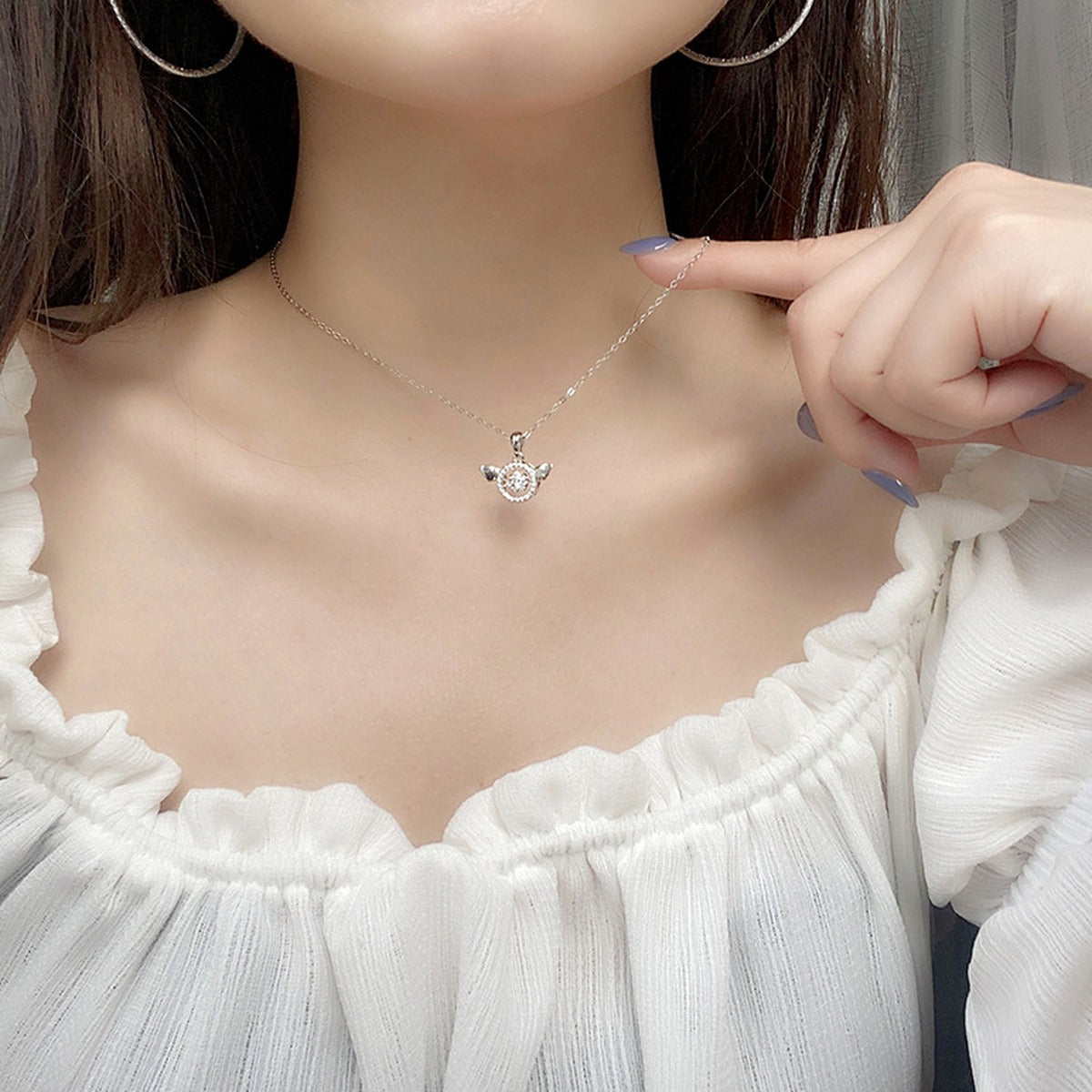 Angel Wing Round Moissanite Necklace with CZ in White Gold-Plated S925 sterling silver neckline model view showing pendant scale and chain length