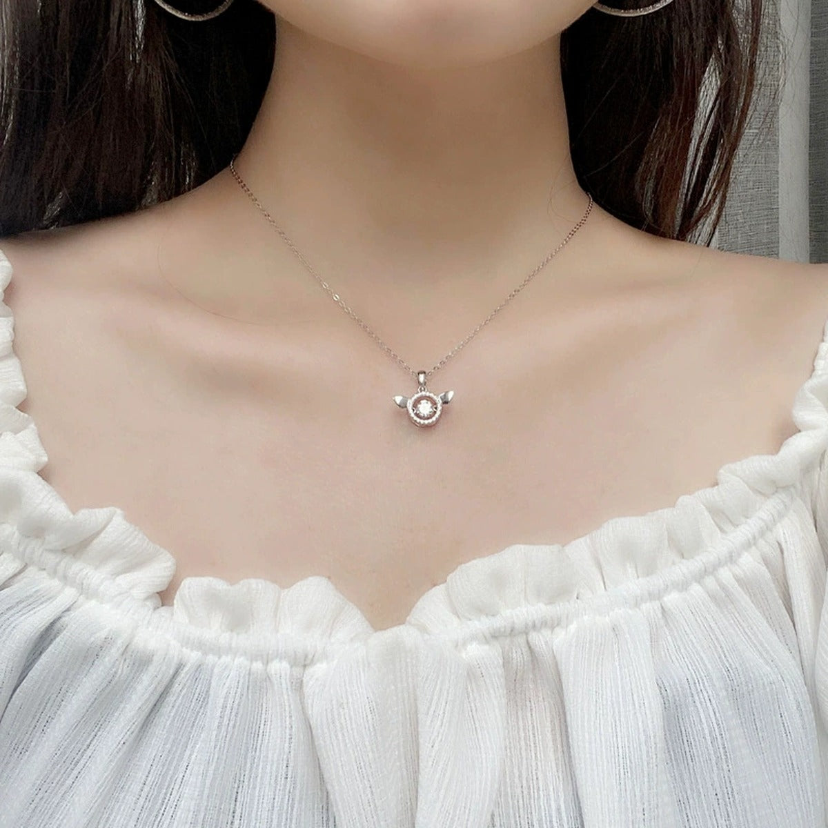 Angel Wing Round Moissanite Necklace with CZ in White Gold-Plated S925 sterling silver neckline model view showing pendant scale and chain length