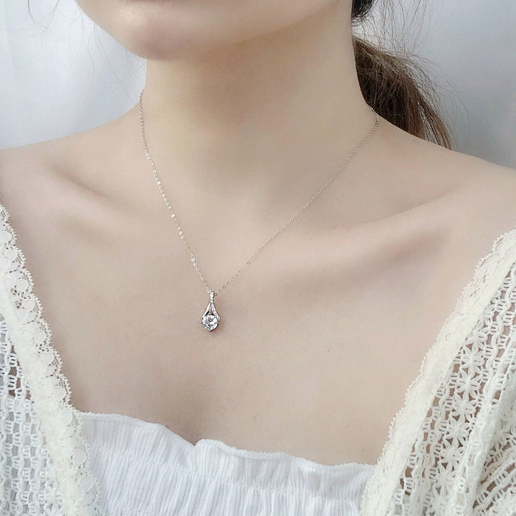Curved Drop Round Moissanite Necklace with CZ in White Gold-Plated S925 sterling silver neckline model view showing pendant scale and chain length