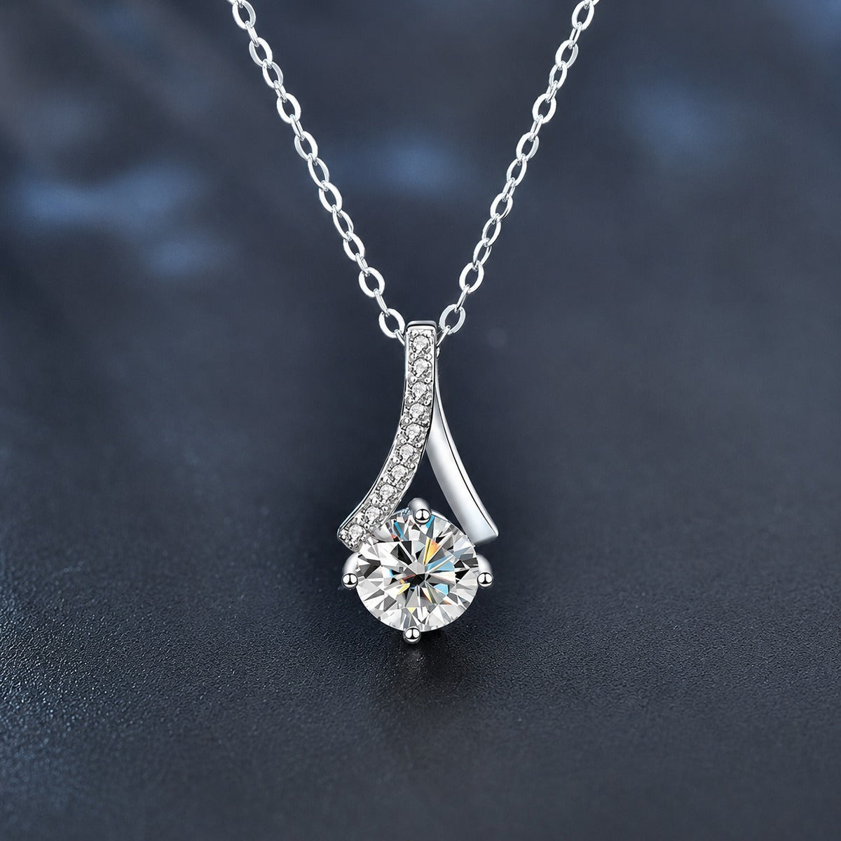 Curved Drop Round Moissanite Necklace with CZ in White Gold-Plated S925 sterling silver close-up product scene showing pendant setting