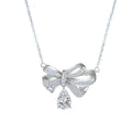 Bowknot Pear Moissanite Necklace with CZ in White Gold-Plated S925 sterling silver white background product photo showing large bowknot ribbon pendant with a pear-cut moissanite drop and CZ accents