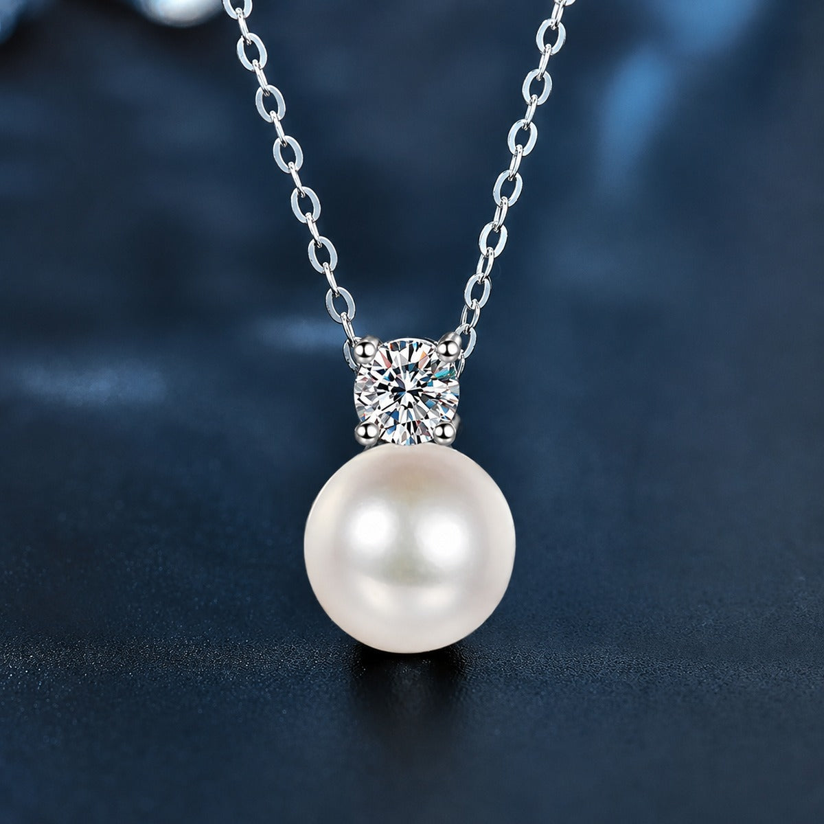 Pearl and Round Moissanite Drop Necklace in Gold-Plated S925 sterling silver close-up styled product scene showing pendant setting