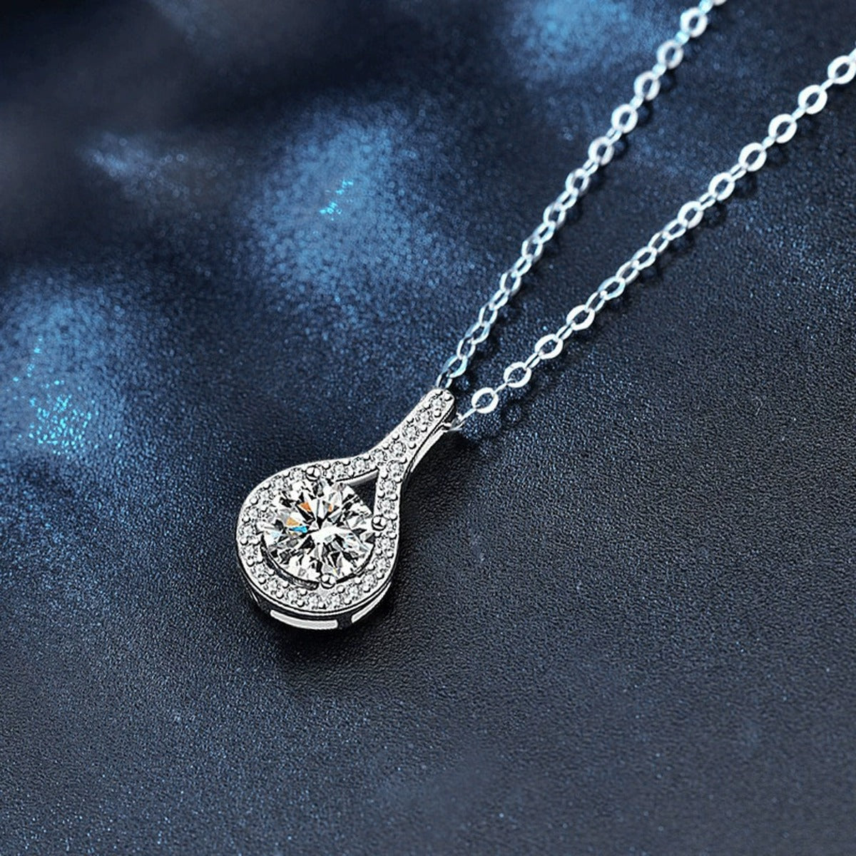 Teardrop Round Moissanite Necklace with CZ in White Gold-Plated S925 sterling silver blue display scene showing chain and stone layout