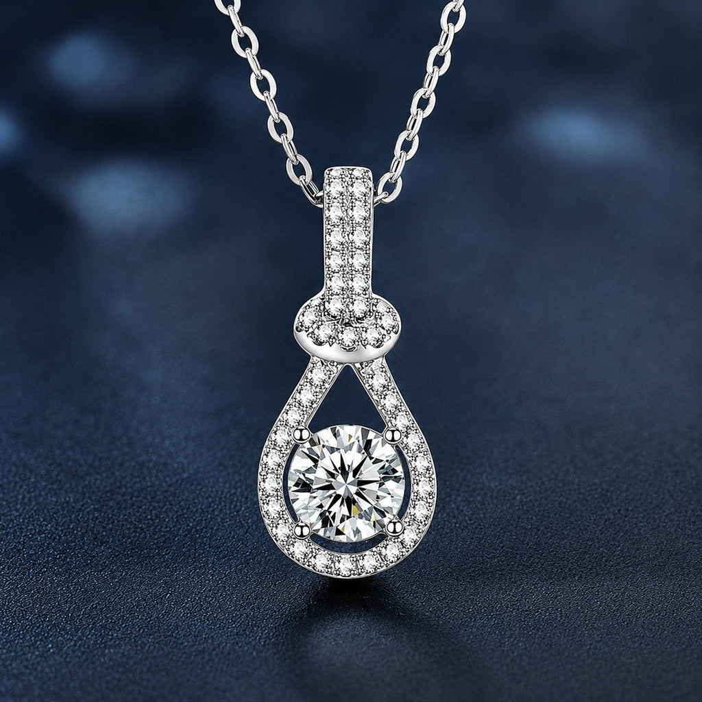 Pear Halo Round Moissanite Necklace with CZ in White Gold-Plated S925 sterling silver close-up product scene showing pendant setting