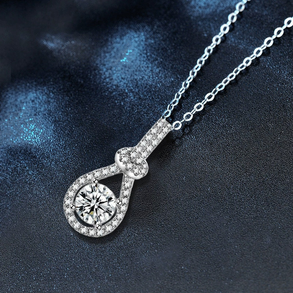 Pear Halo Round Moissanite Necklace with CZ in White Gold-Plated S925 sterling silver blue display scene showing chain and stone layout