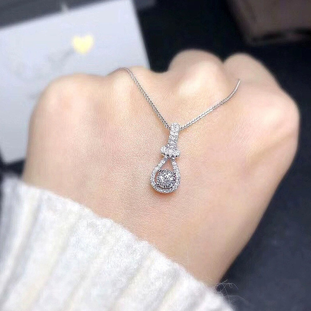 Pear Halo Round Moissanite Necklace with CZ in White Gold-Plated S925 sterling silver angled product detail view
