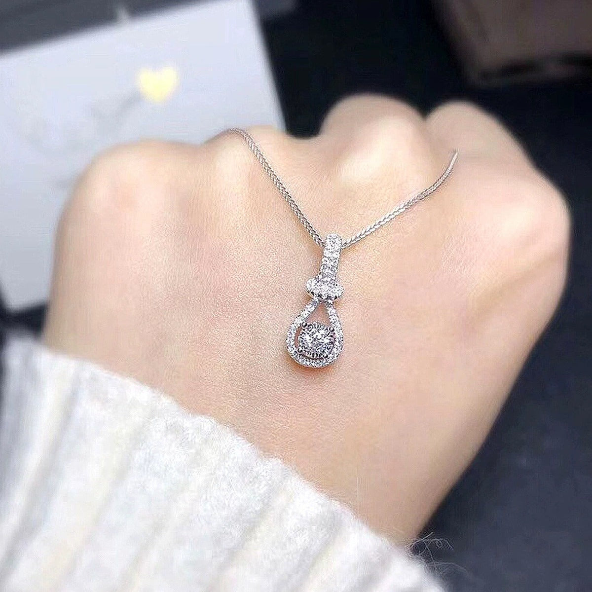 Pear Halo Round Moissanite Necklace with CZ in White Gold-Plated S925 sterling silver angled product detail view