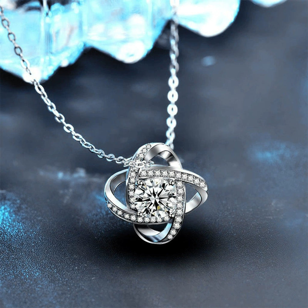 Four-Leaf Clover Round Moissanite Necklace with CZ in White Gold-Plated S925 sterling silver blue display scene showing chain and stone layout