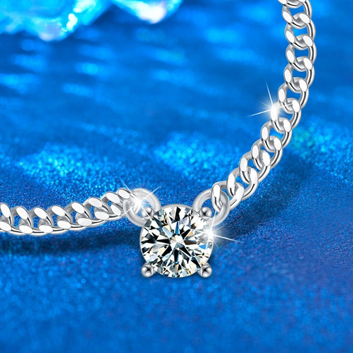Cuban Chain Solitaire Round Moissanite Necklace in White Gold-Plated S925 sterling silver blue display scene showing chain and stone layout