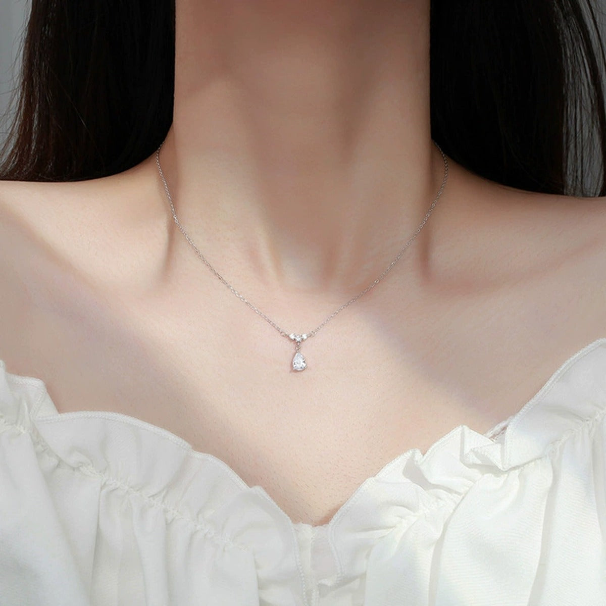 Pear Cut Teardrop Moissanite Necklace with CZ in White Gold-Plated S925 sterling silver neckline model view showing pendant scale and chain length