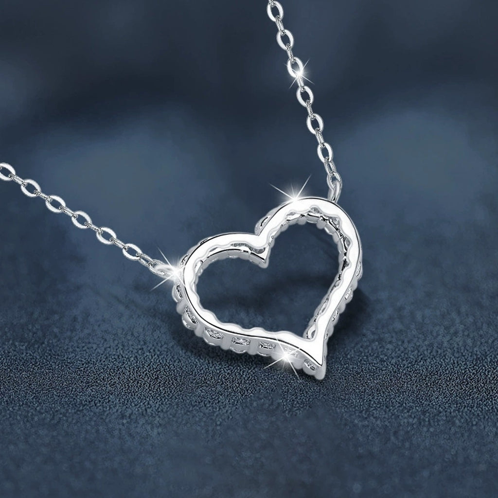Open Heart Moissanite Necklace in White Gold-Plated S925 sterling silver blue display scene showing chain and stone layout