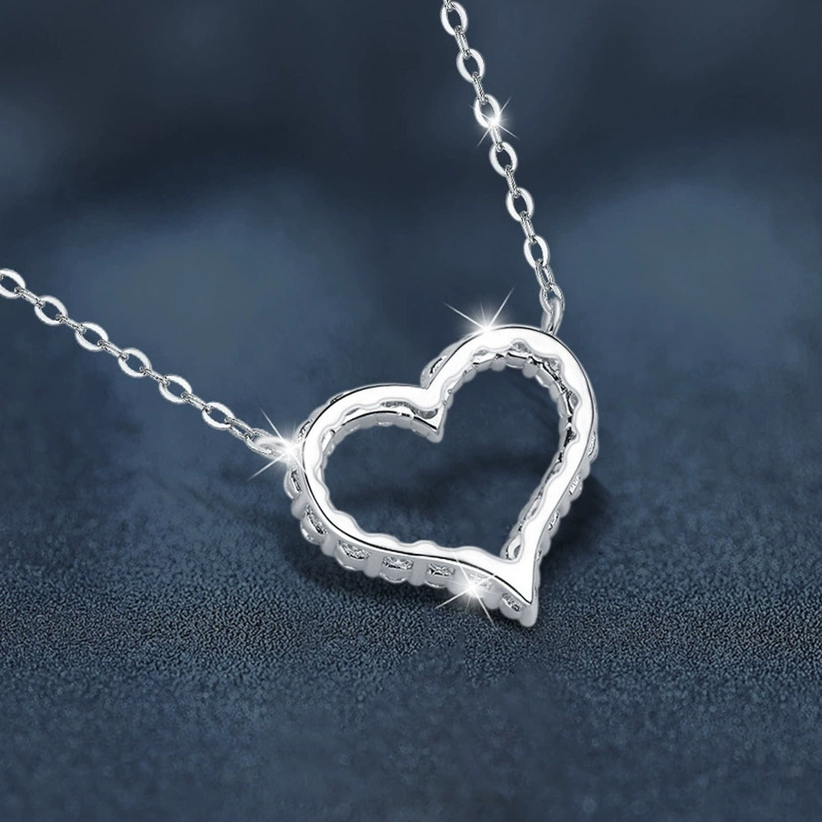 Open Heart Moissanite Necklace in White Gold-Plated S925 sterling silver blue display scene showing chain and stone layout