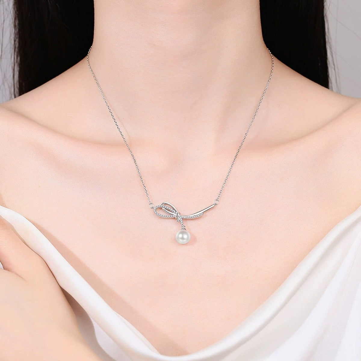 Bowknot Pearl and Moissanite Necklace in White Gold-Plated S925 sterling silver neckline model view showing pendant scale and chain length