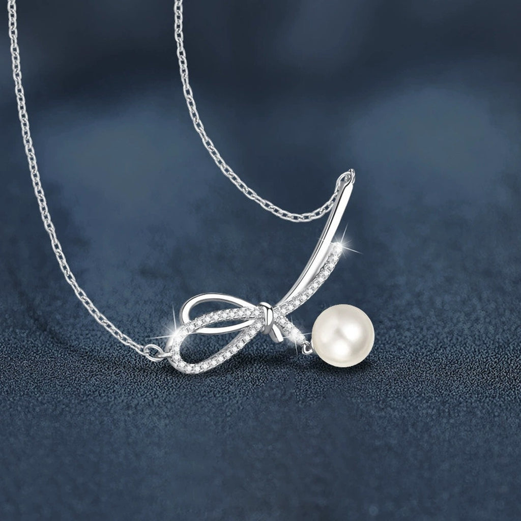 Bowknot Pearl and Moissanite Necklace in White Gold-Plated S925 sterling silver blue display scene showing chain and stone layout