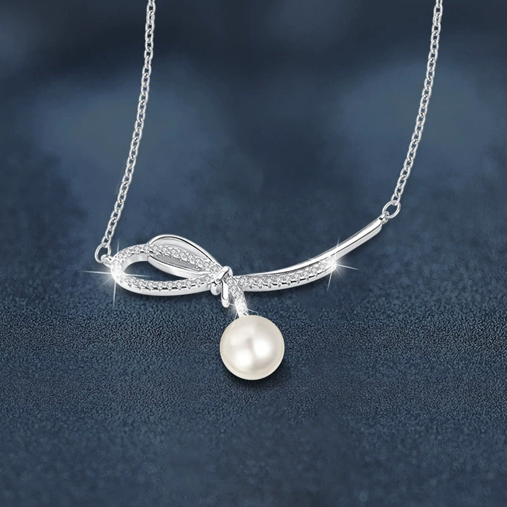 Bowknot Pearl and Moissanite Necklace in White Gold-Plated S925 sterling silver angled product detail view