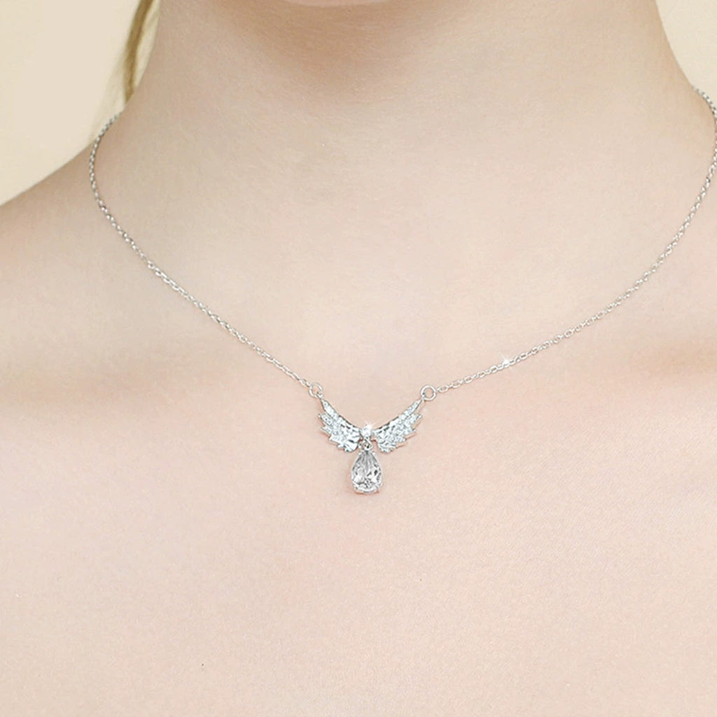 Angel Wing Pear Cut Moissanite Necklace with CZ in White Gold-Plated S925 sterling silver neckline model view showing pendant scale and chain length