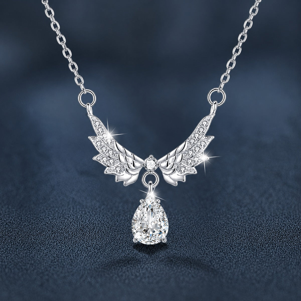 Angel Wing Pear Cut Moissanite Necklace with CZ in White Gold-Plated S925 sterling silver close-up product scene showing pendant setting