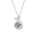 Whale Tail Round Moissanite Necklace with CZ in White Gold-Plated S925 sterling silver white background product photo showing whale tail pendant with a 1 ct round moissanite and CZ accents