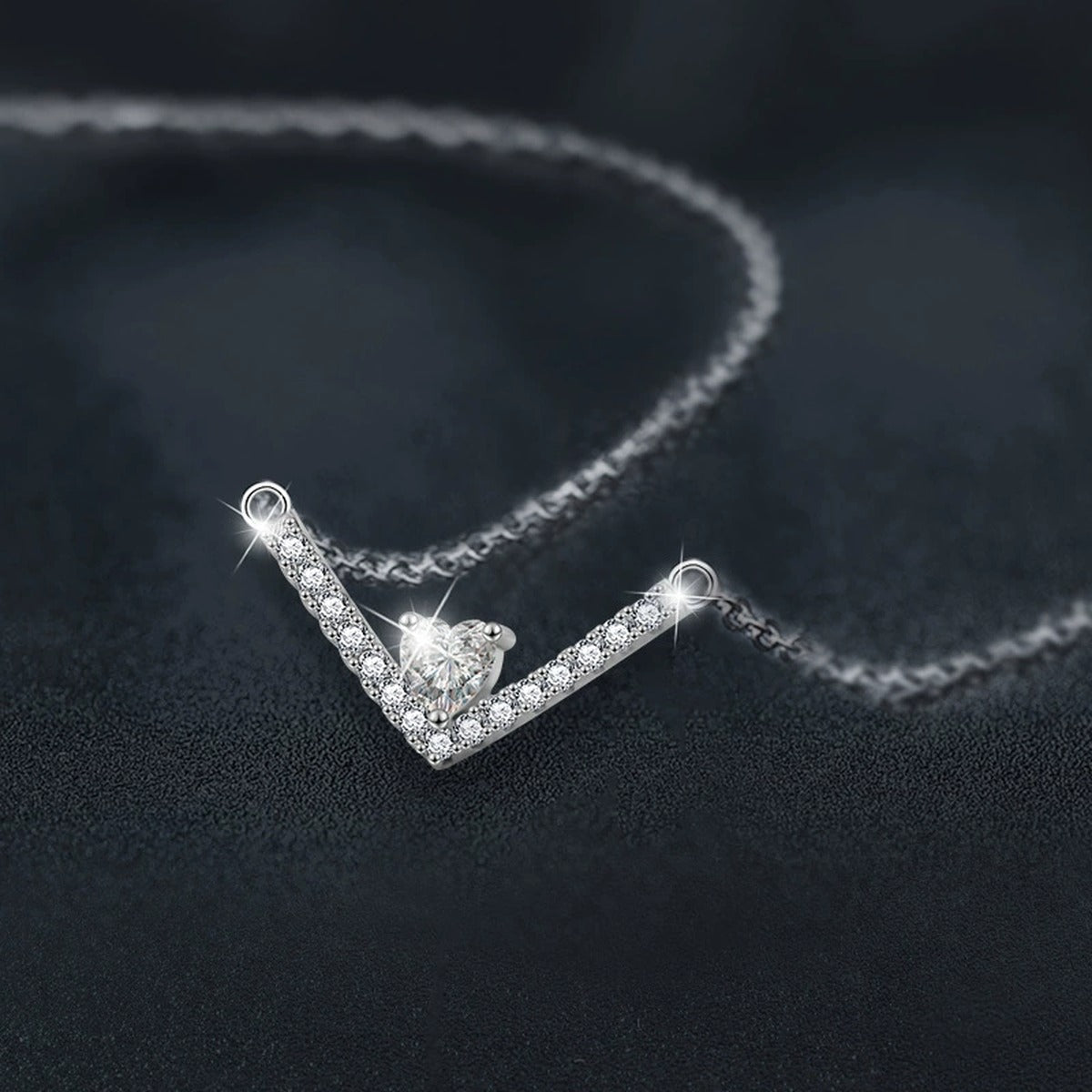 V Heart Cut Moissanite Necklace with CZ in White Gold-Plated S925 sterling silver blue display scene showing chain and stone layout