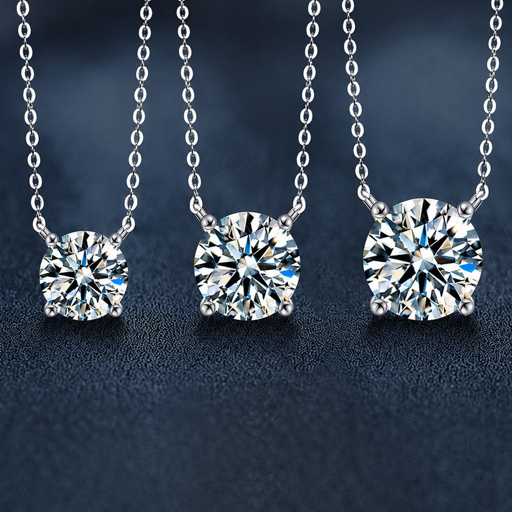 Four-Prong Round Moissanite Solitaire Necklace in Gold-Plated S925 sterling silver close-up styled product scene showing pendant setting