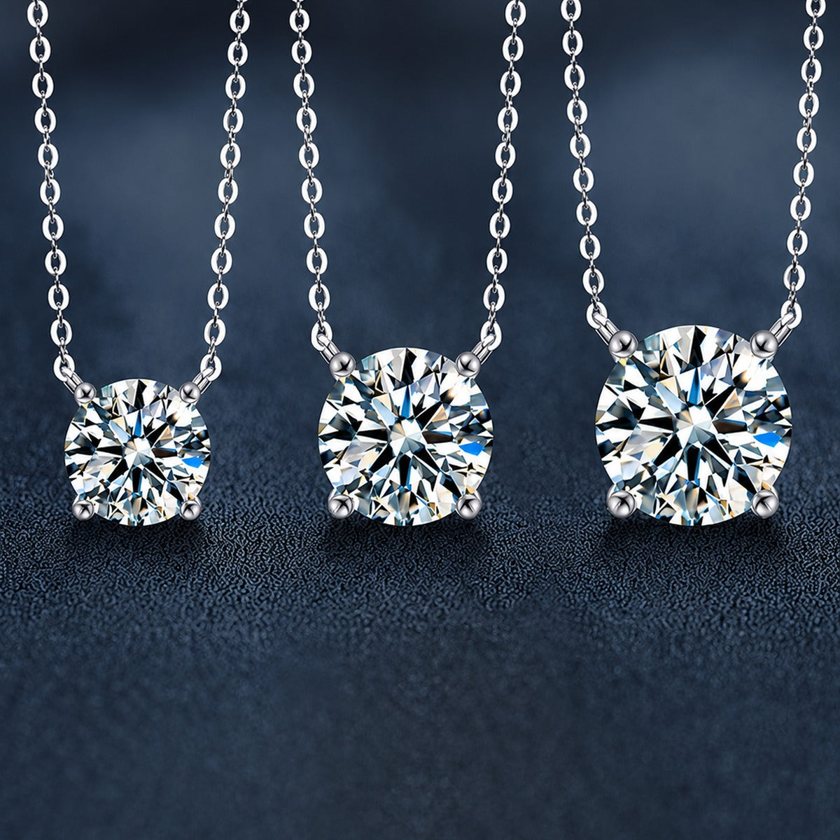 Four-Prong Round Moissanite Solitaire Necklace in Gold-Plated S925 sterling silver close-up styled product scene showing pendant setting