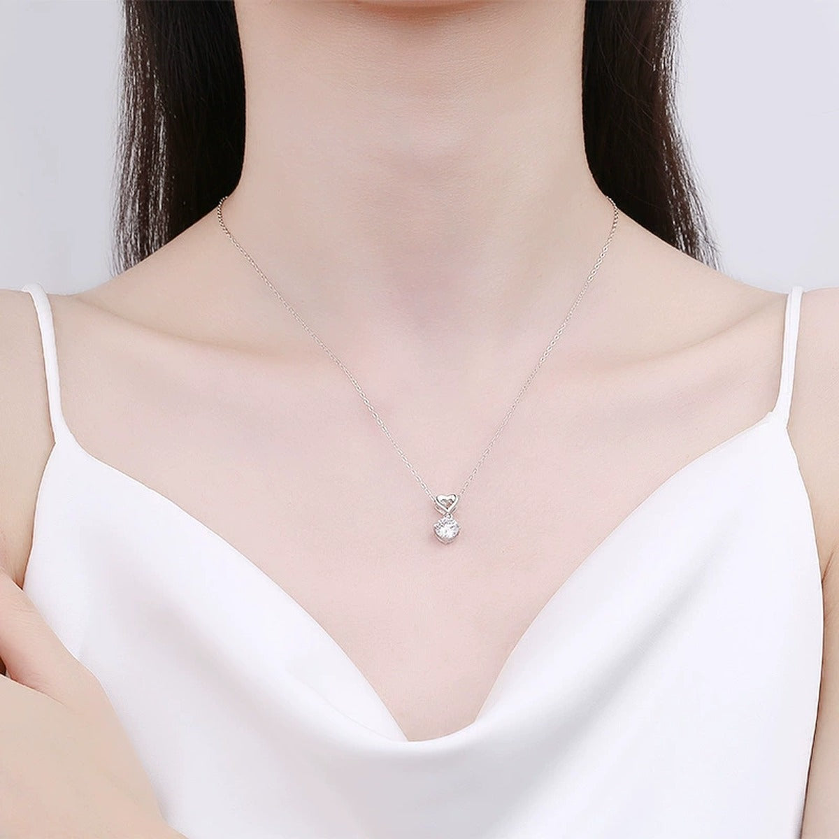 Open Heart Solitaire Round Moissanite Necklace in White Gold-Plated S925 sterling silver neckline model view showing pendant scale and chain length