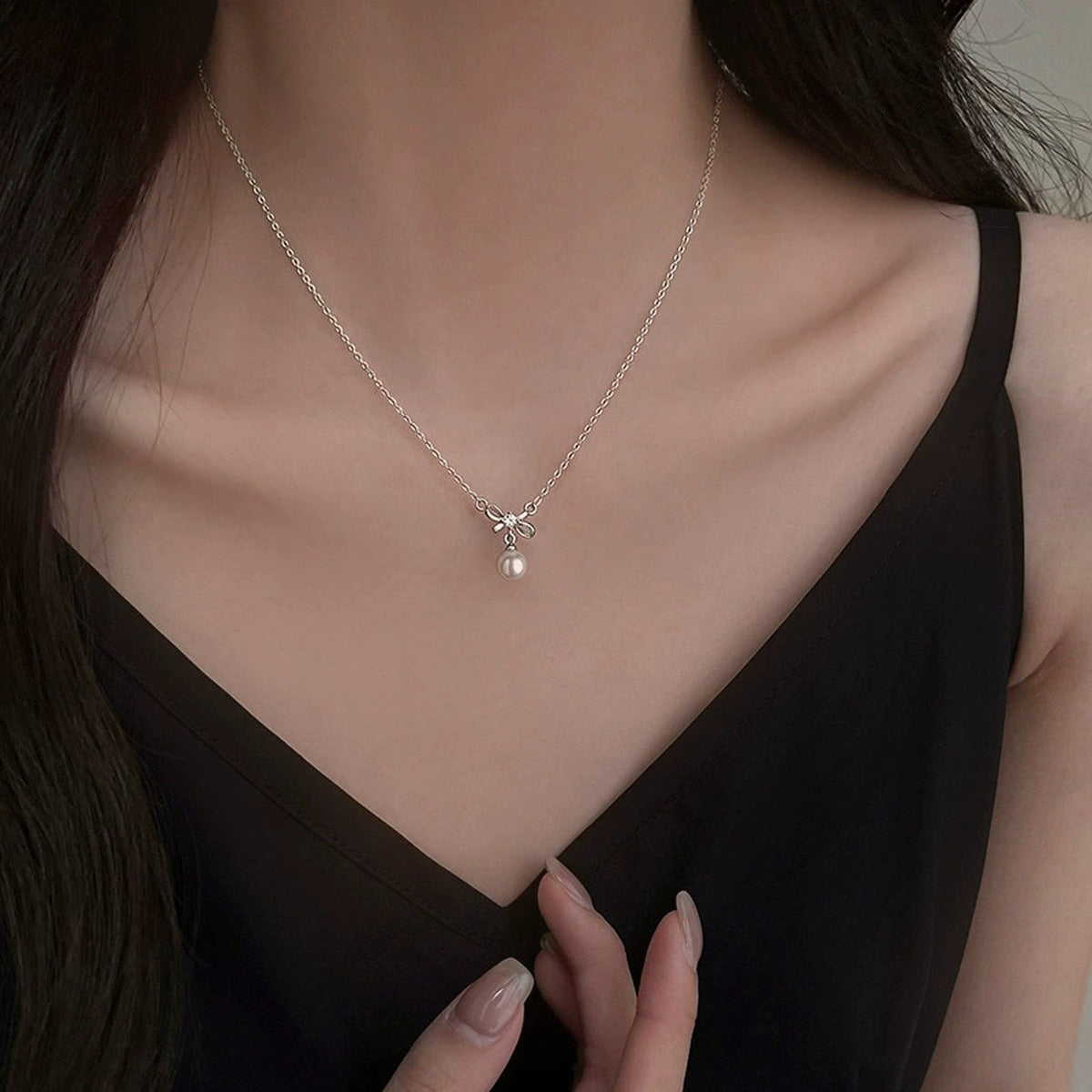 Bowknot Round Moissanite and Pearl Necklace in Gold-Plated S925 sterling silver neckline model view showing pendant scale and chain length