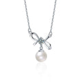 Bowknot Round Moissanite and Pearl Necklace in Gold-Plated S925 sterling silver alternate metal color white background product view showing an airy bowknot set with a round moissanite above a pearl drop