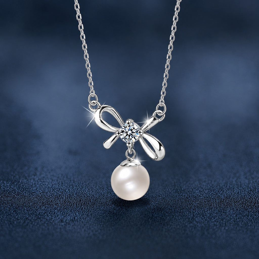 Bowknot Round Moissanite and Pearl Necklace in Gold-Plated S925 sterling silver close-up styled product scene showing pendant setting