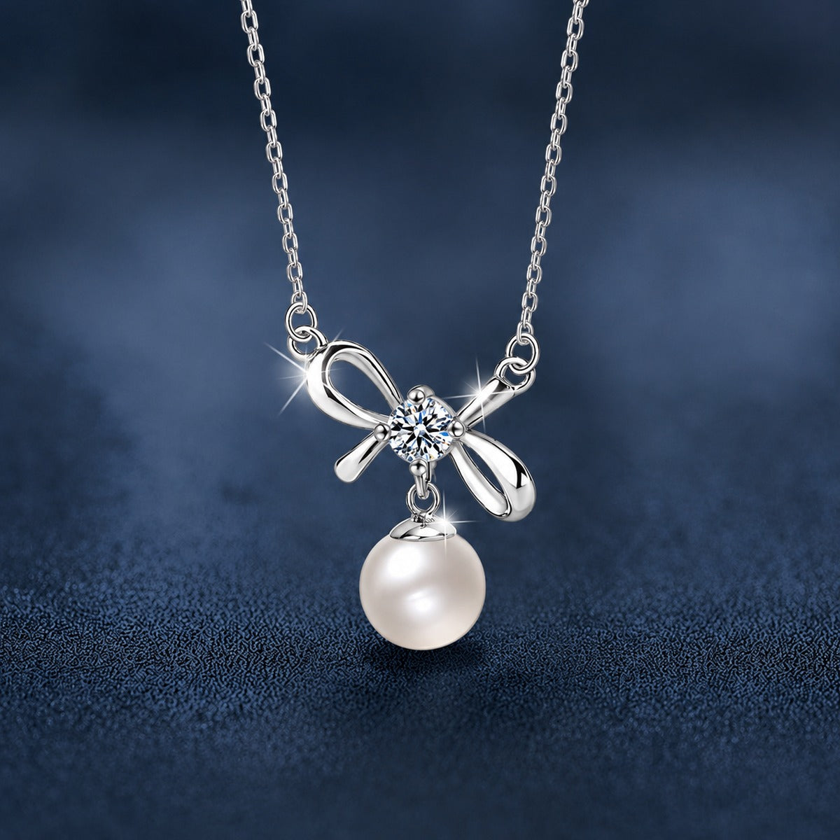 Bowknot Round Moissanite and Pearl Necklace in Gold-Plated S925 sterling silver close-up styled product scene showing pendant setting