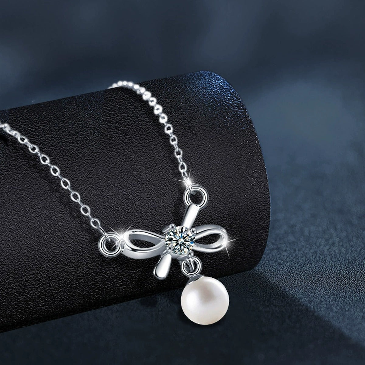 Bowknot Round Moissanite and Pearl Necklace in Gold-Plated S925 sterling silver angled product detail view