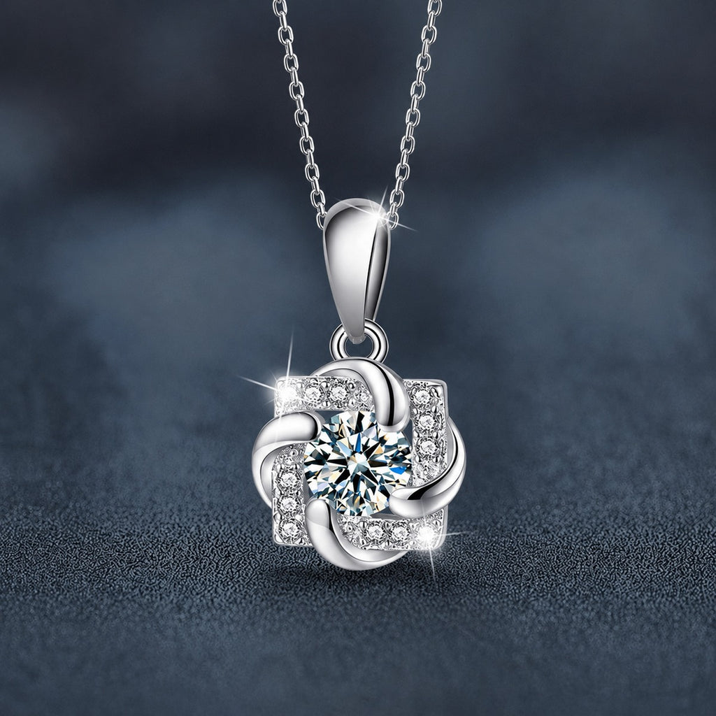 Pinwheel Round Moissanite Necklace with CZ in White Gold-Plated S925 sterling silver close-up product scene showing pendant setting