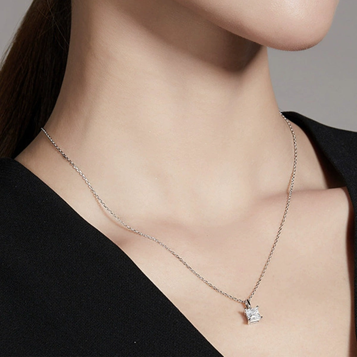 Princess Cut Moissanite Necklace in White Gold-Plated S925 sterling silver neckline model view showing pendant scale and chain length