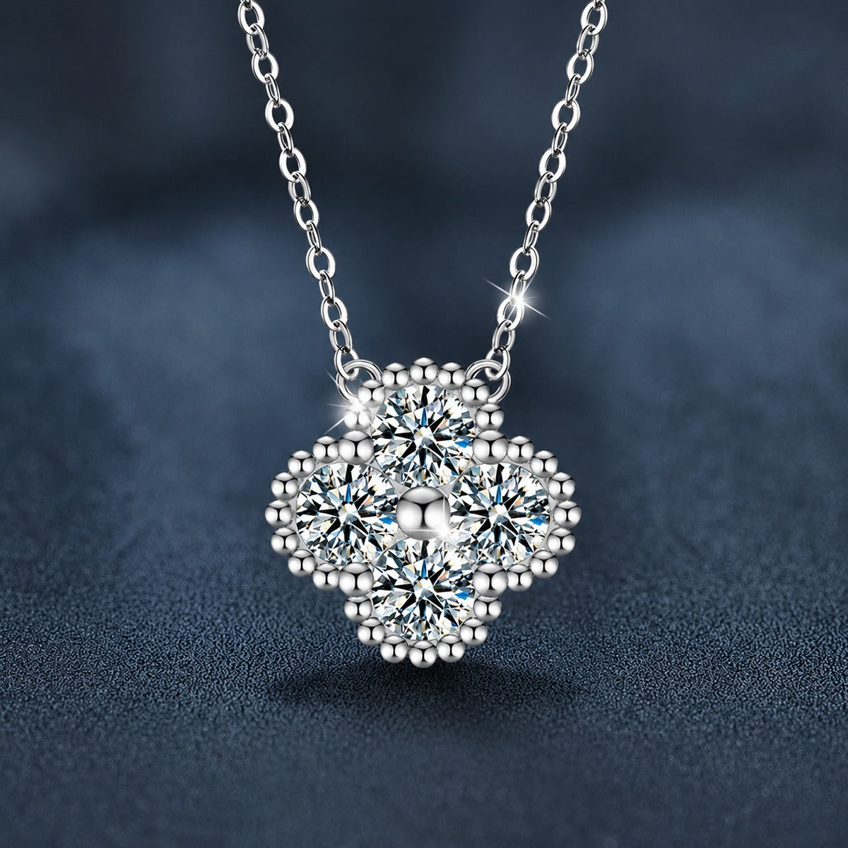 Four-Leaf Clover Round Moissanite Necklace in Gold-Plated S925 sterling silver close-up styled product scene showing pendant setting