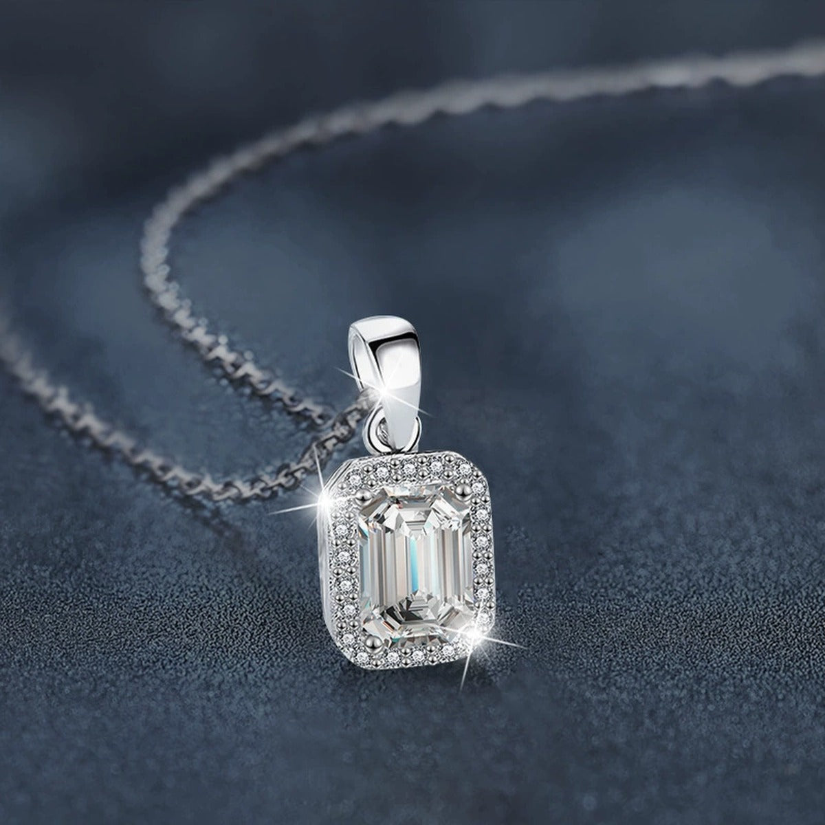 Emerald Cut Moissanite Halo Necklace with CZ in White Gold-Plated S925 sterling silver blue display scene showing chain and stone layout