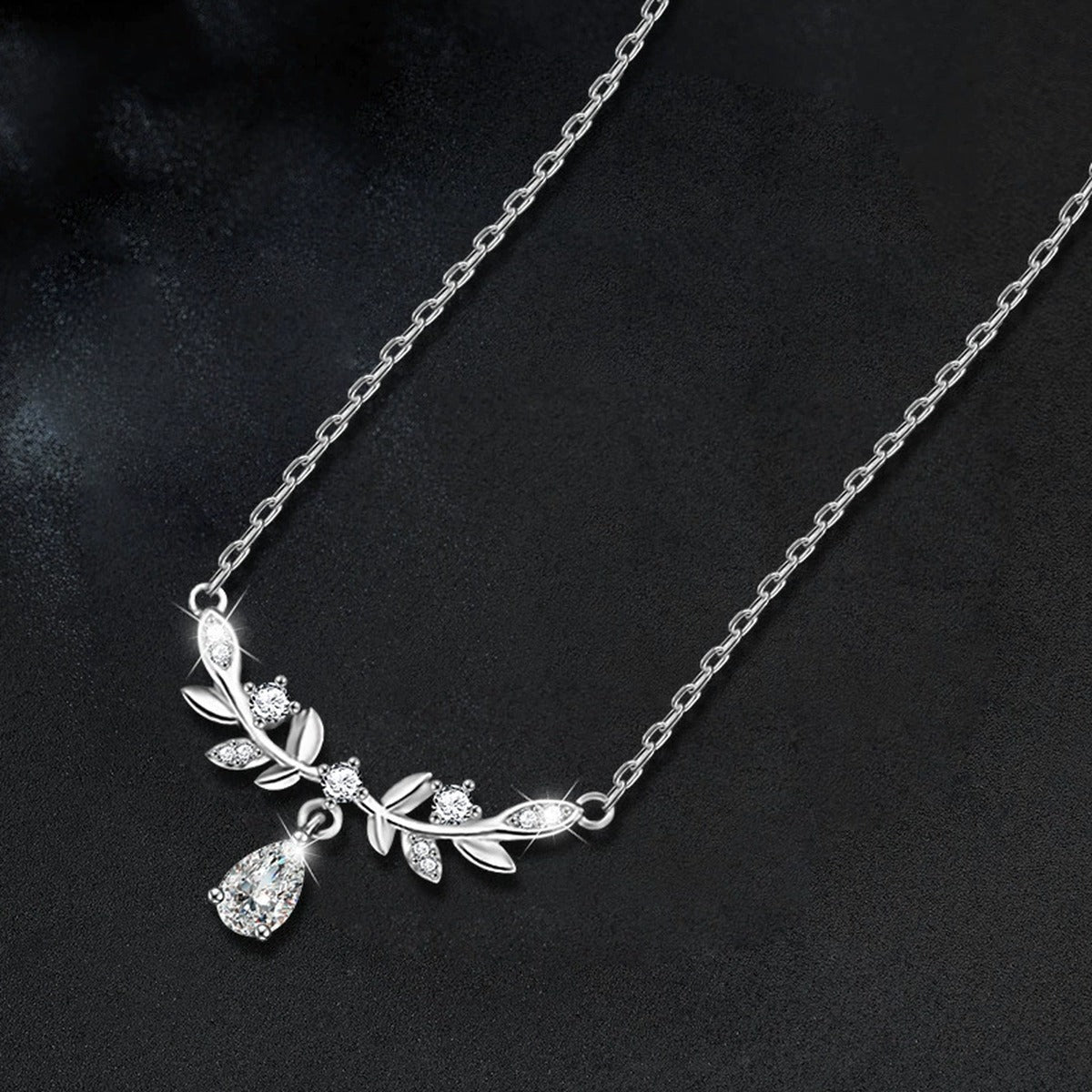 Wheat Pear Cut Moissanite Necklace with CZ in White Gold-Plated S925 sterling silver blue display scene showing chain and stone layout