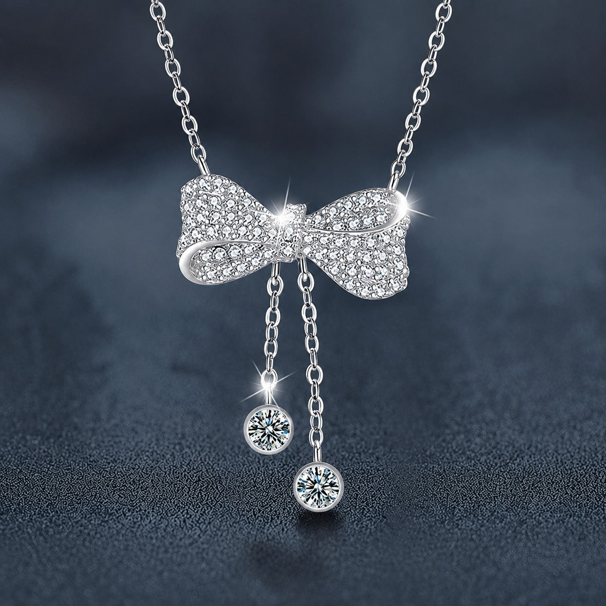 Bowknot Tassel Moissanite Necklace with CZ in White Gold-Plated S925 sterling silver close-up product scene showing pendant setting
