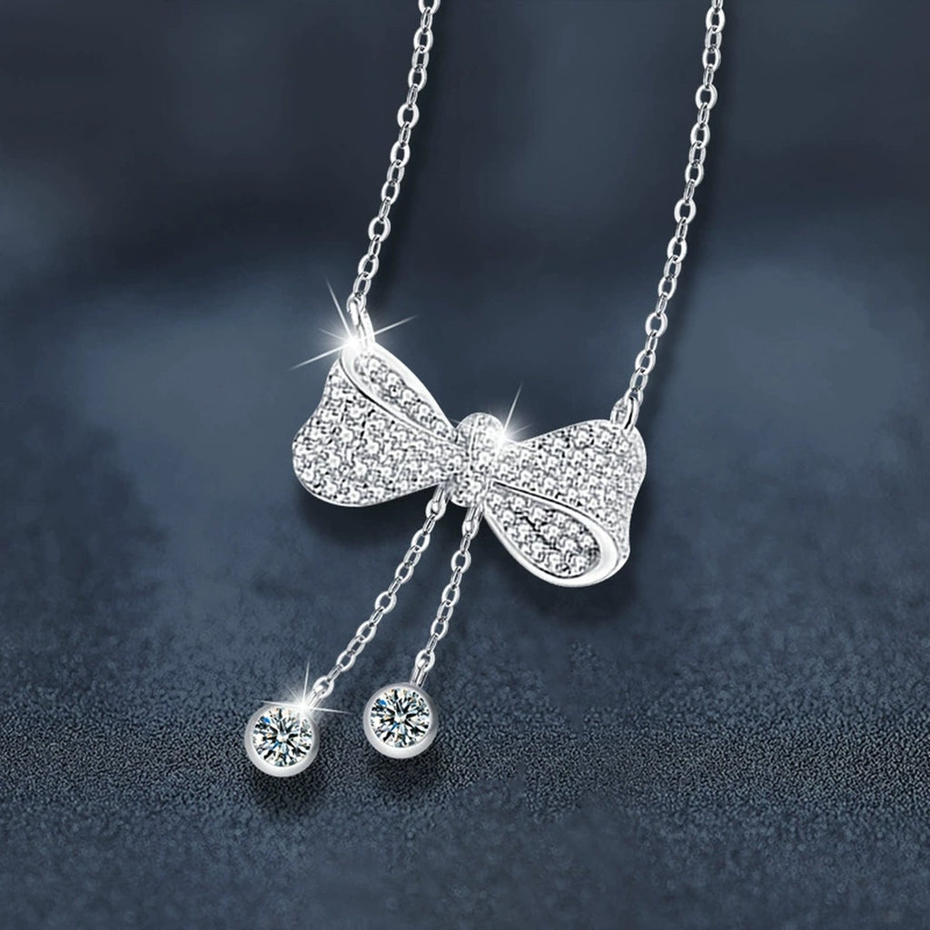 Bowknot Tassel Moissanite Necklace with CZ in White Gold-Plated S925 sterling silver blue display scene showing chain and stone layout