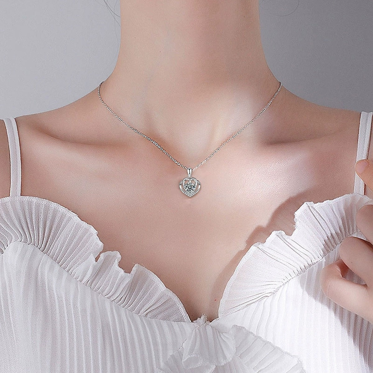 Layered Heart Round Moissanite Necklace with CZ in White Gold-Plated S925 sterling silver neckline model view showing pendant scale and chain length