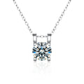 Round Moissanite Solitaire Necklace in Gold-Plated S925 sterling silver white background front product view showing a compact round solitaire held in a clean open basket