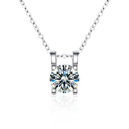 Round Moissanite Solitaire Necklace in Gold-Plated S925 sterling silver white background front product view showing a compact round solitaire held in a clean open basket