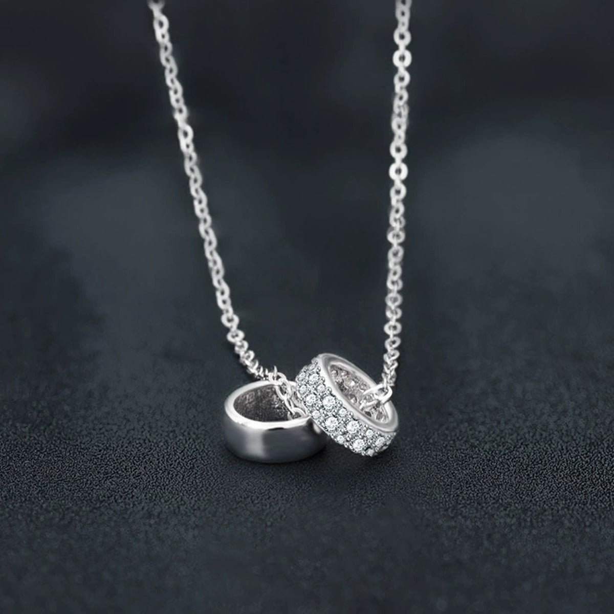 Double Circle Moissanite Necklace in Gold-Plated S925 sterling silver blue display scene showing chain and stone layout