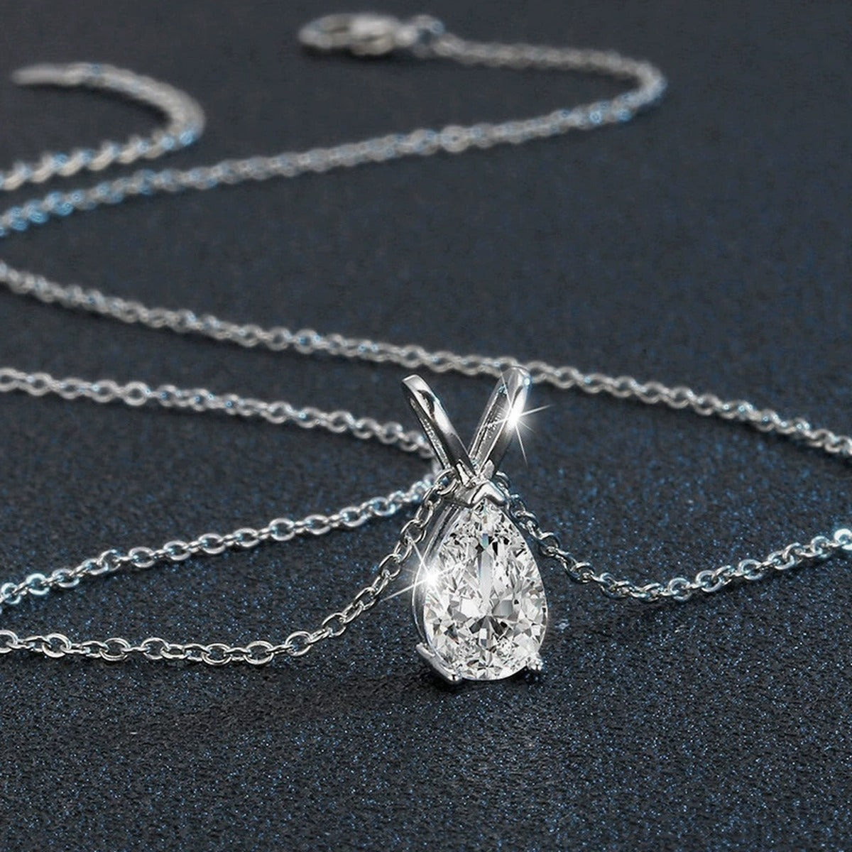 Pear Cut Moissanite Solitaire Necklace in Gold-Plated S925 sterling silver display scene showing chain and stone layout