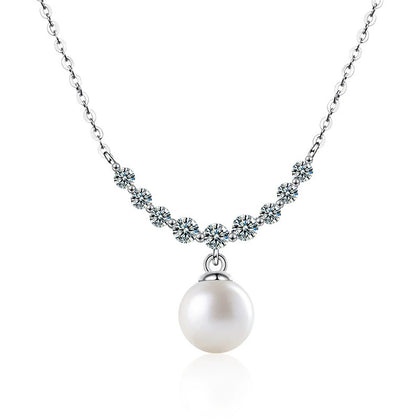 Smile Moissanite and Pearl Necklace in White Gold-Plated S925 sterling silver white background front product view showing a curved smile of round moissanite above a pearl drop