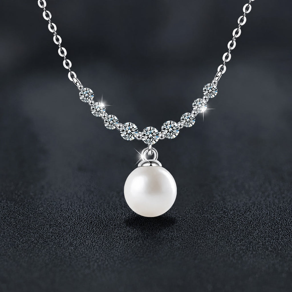 Smile Moissanite and Pearl Necklace in White Gold-Plated S925 sterling silver close-up styled product scene showing pendant setting