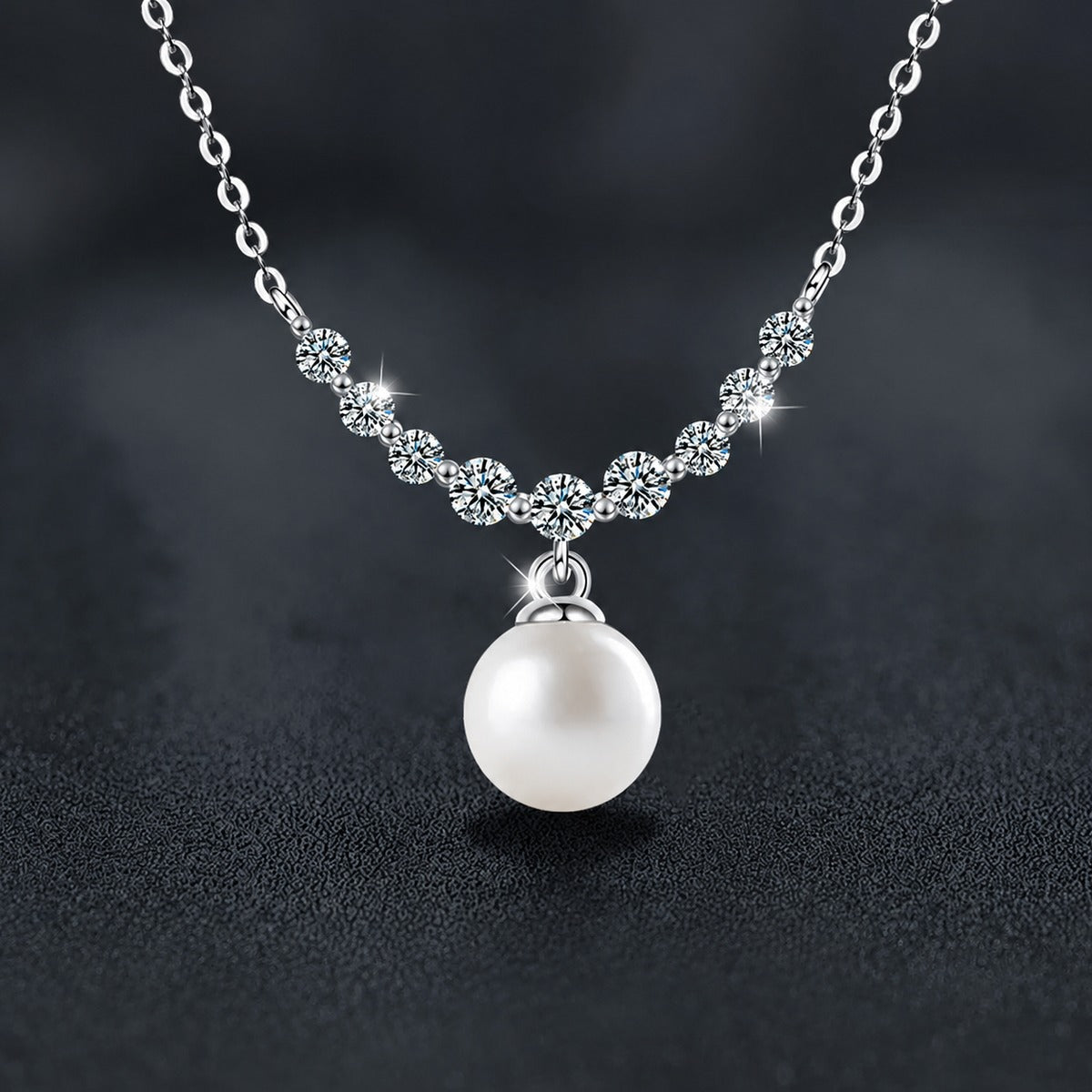 Smile Moissanite and Pearl Necklace in White Gold-Plated S925 sterling silver close-up styled product scene showing pendant setting